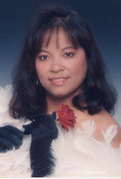 Corim in a white dress